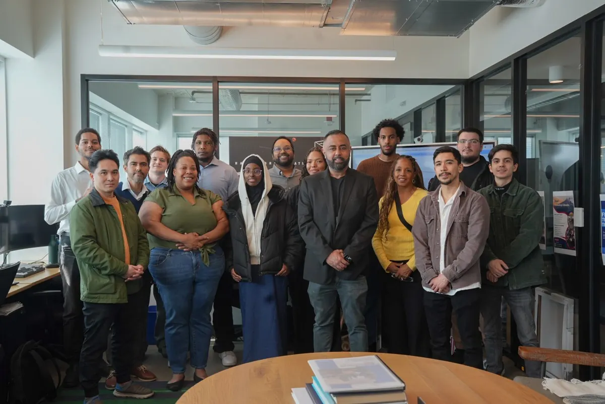 Omer Qureshi with the Americans 4 Equality intern cohort and team in the office.